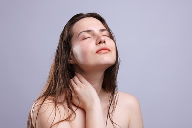 Photo of Beautiful woman with natural skin complexion on grey background, closeup