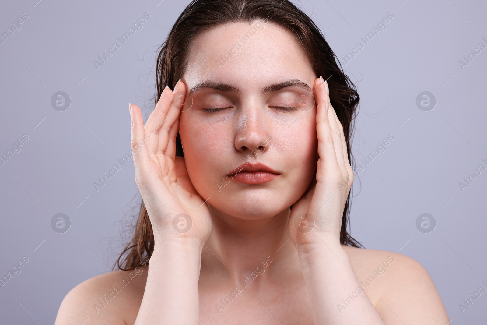 Photo of Beautiful woman with natural skin complexion on grey background, closeup