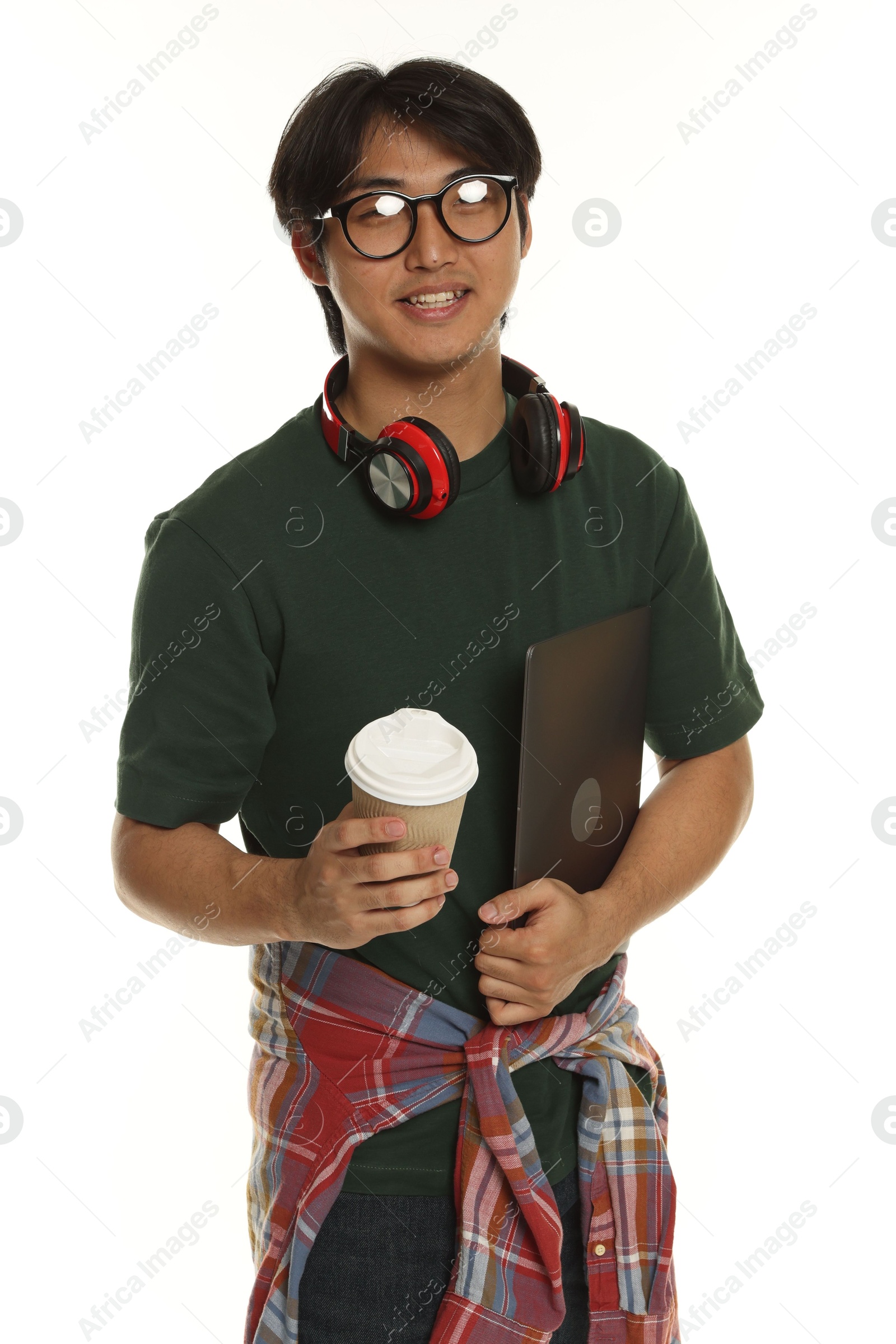 Student with headphones, coffee and laptop on white background Photo of Student with headphones, coffee and laptop on white background