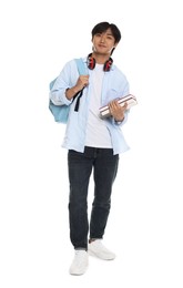 Photo of Student with headphones, books and backpack on white background