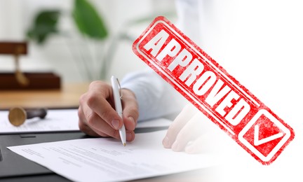 Image of Man signing document at table in office and red stamp Approved, banner design