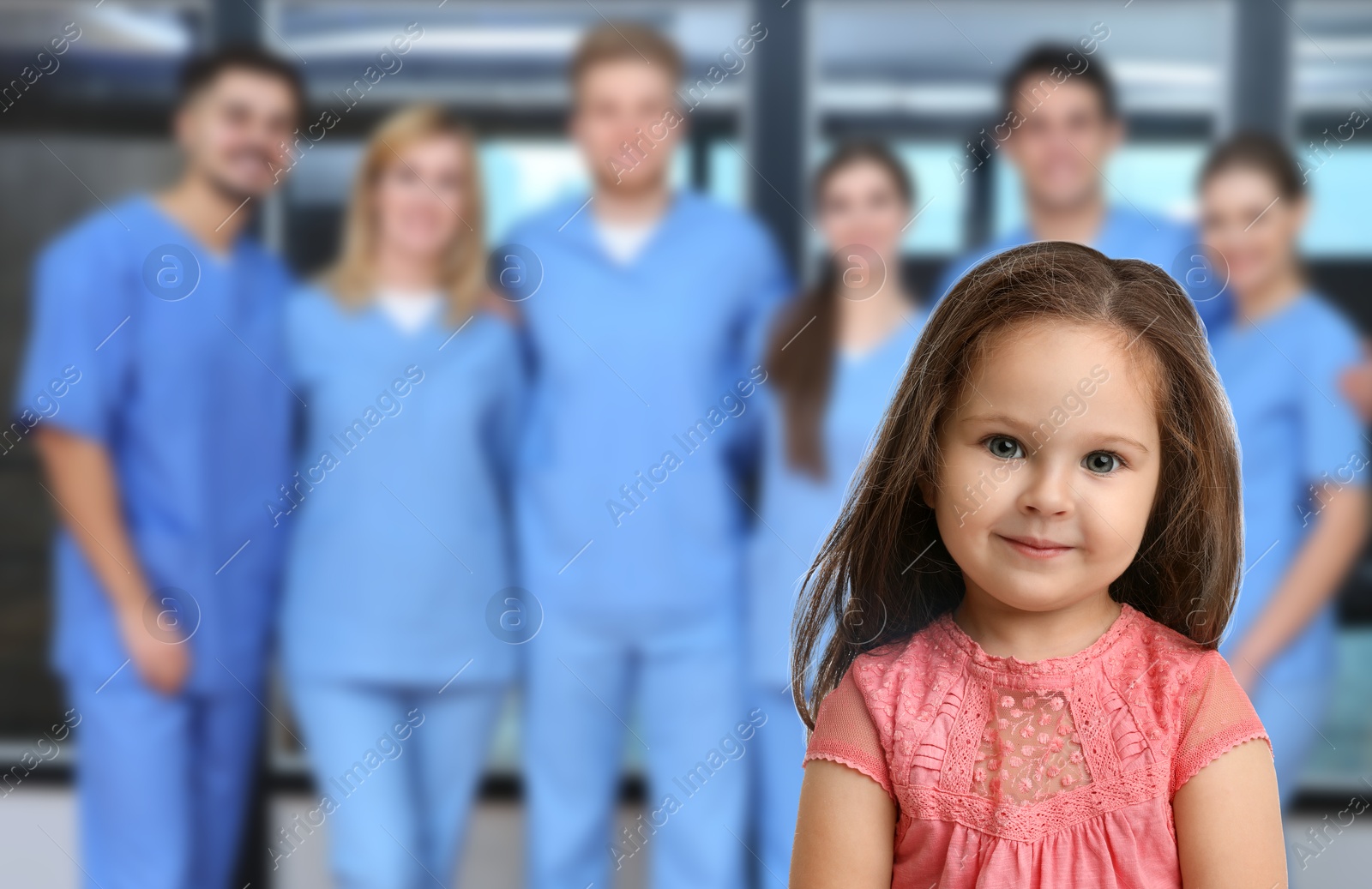 Cute child and medical staff in hospital. Pediatric ward Image of Cute child and medical staff in hospital. Pediatric ward