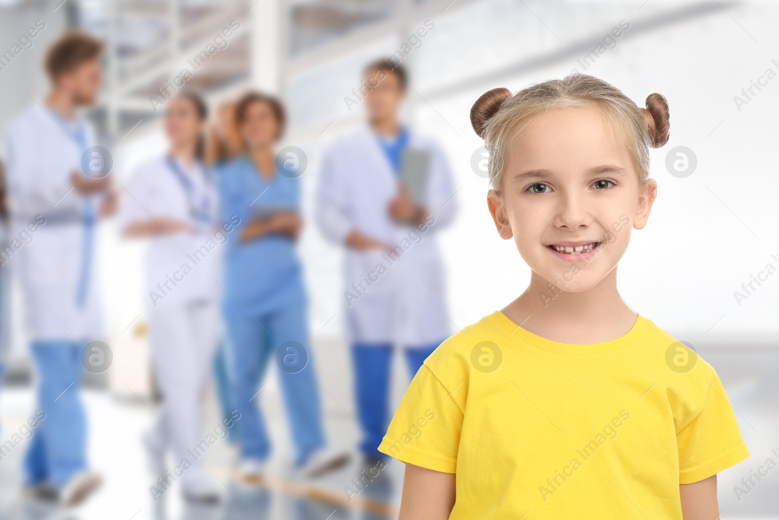 Image of Cute child and medical staff in hospital. Pediatric ward
