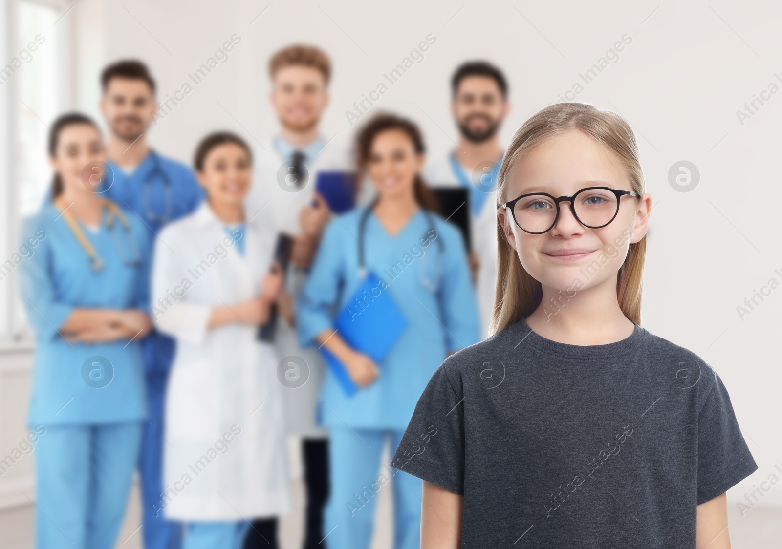 Image of Cute child and medical staff in hospital. Pediatric ward