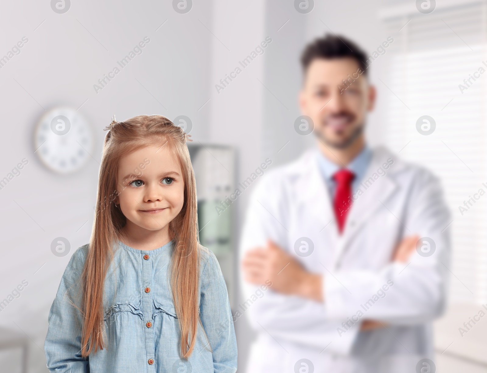 Image of Cute child and doctor in hospital. Pediatric ward