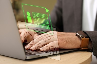 Image of Human resources manager searching for employee on laptop at table, closeup. Resumes on virtual screen above computer. Recruitment