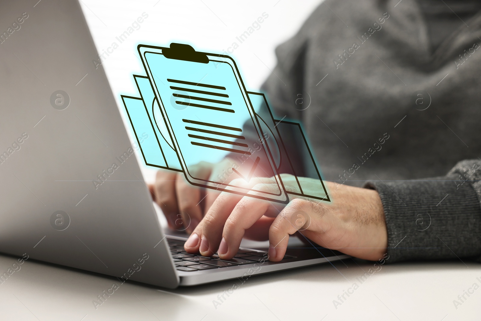 Human resources manager working on laptop at table, closeup. Candidate's resume on virtual screen above computer. Recruitment and employee search Image of Human resources manager working on laptop at table, closeup. Candidate's resume on virtual screen above computer. Recruitment and employee search
