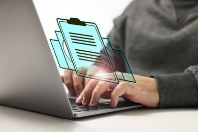 Image of Human resources manager working on laptop at table, closeup. Candidate's resume on virtual screen above computer. Recruitment and employee search