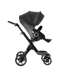 Image of Baby carriage. Modern pram with black canopy isolated on white