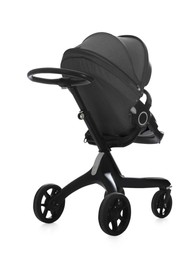 Image of Baby carriage. Modern pram with black canopy isolated on white