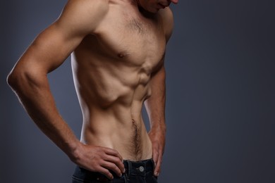 Photo of Man suffering from anorexia on grey background, closeup. Space for text
