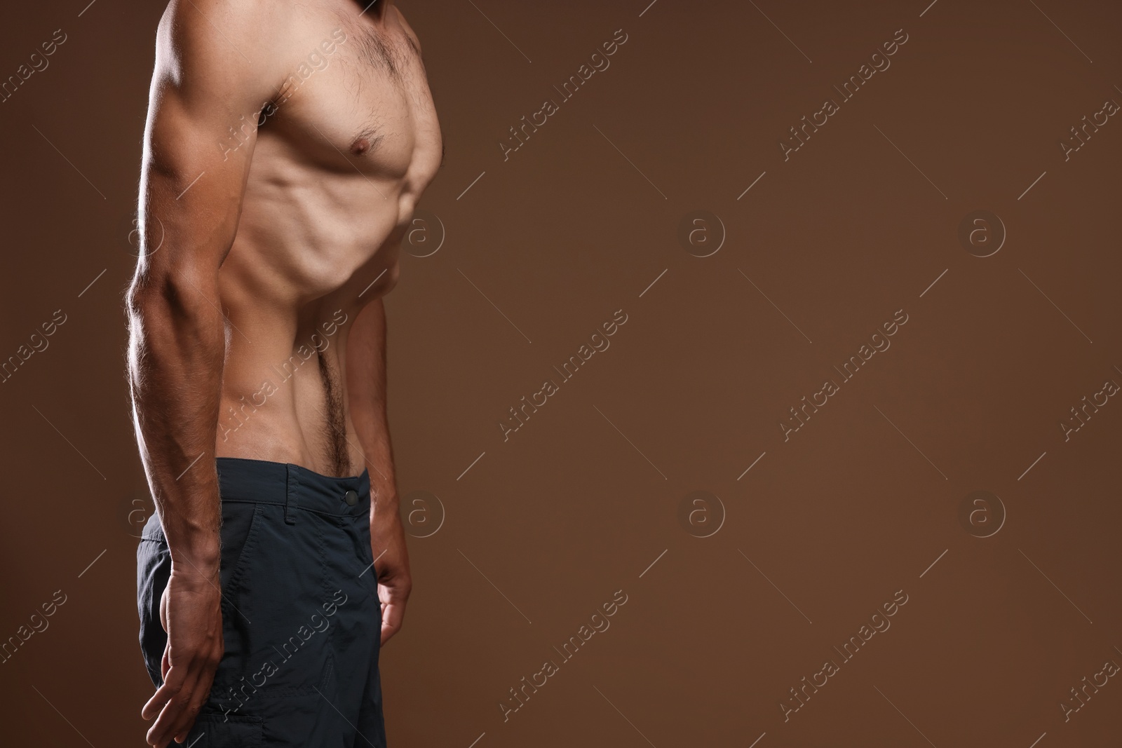 Man suffering from anorexia on beige background, closeup. Space for text Photo of Man suffering from anorexia on beige background, closeup. Space for text