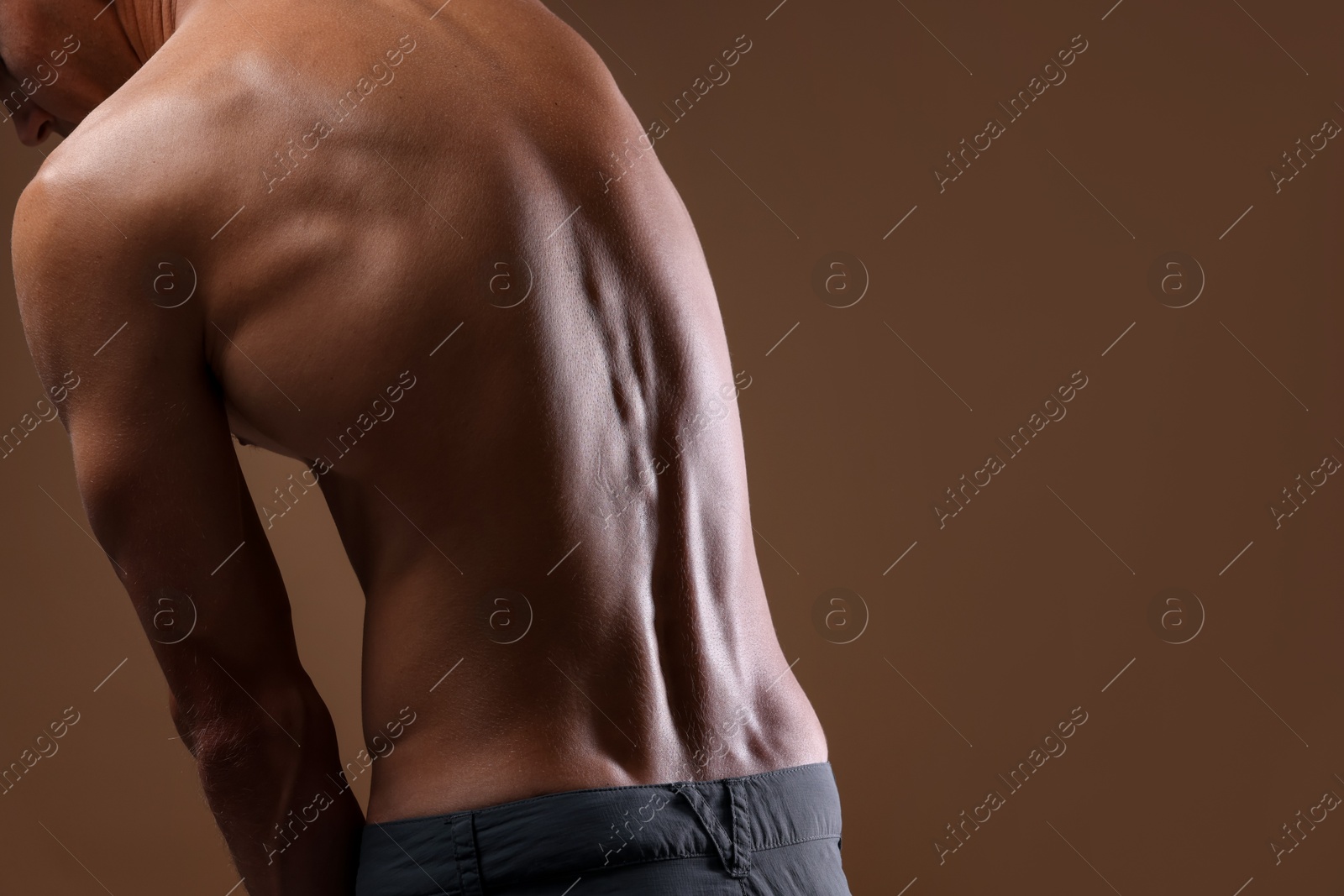 Man suffering from anorexia on beige background, closeup. Space for text Photo of Man suffering from anorexia on beige background, closeup. Space for text