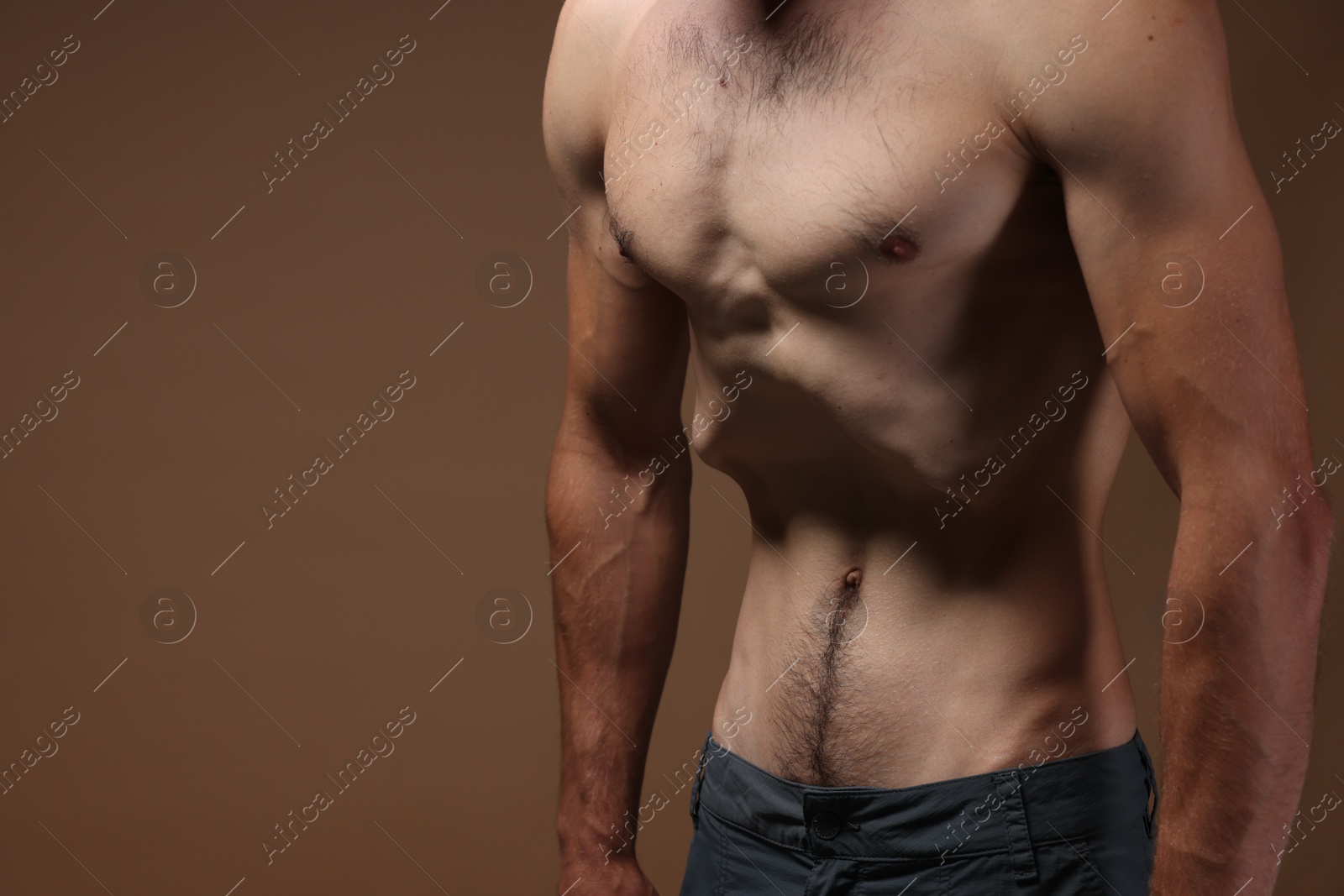 Man suffering from anorexia on beige background, closeup. Space for text Photo of Man suffering from anorexia on beige background, closeup. Space for text