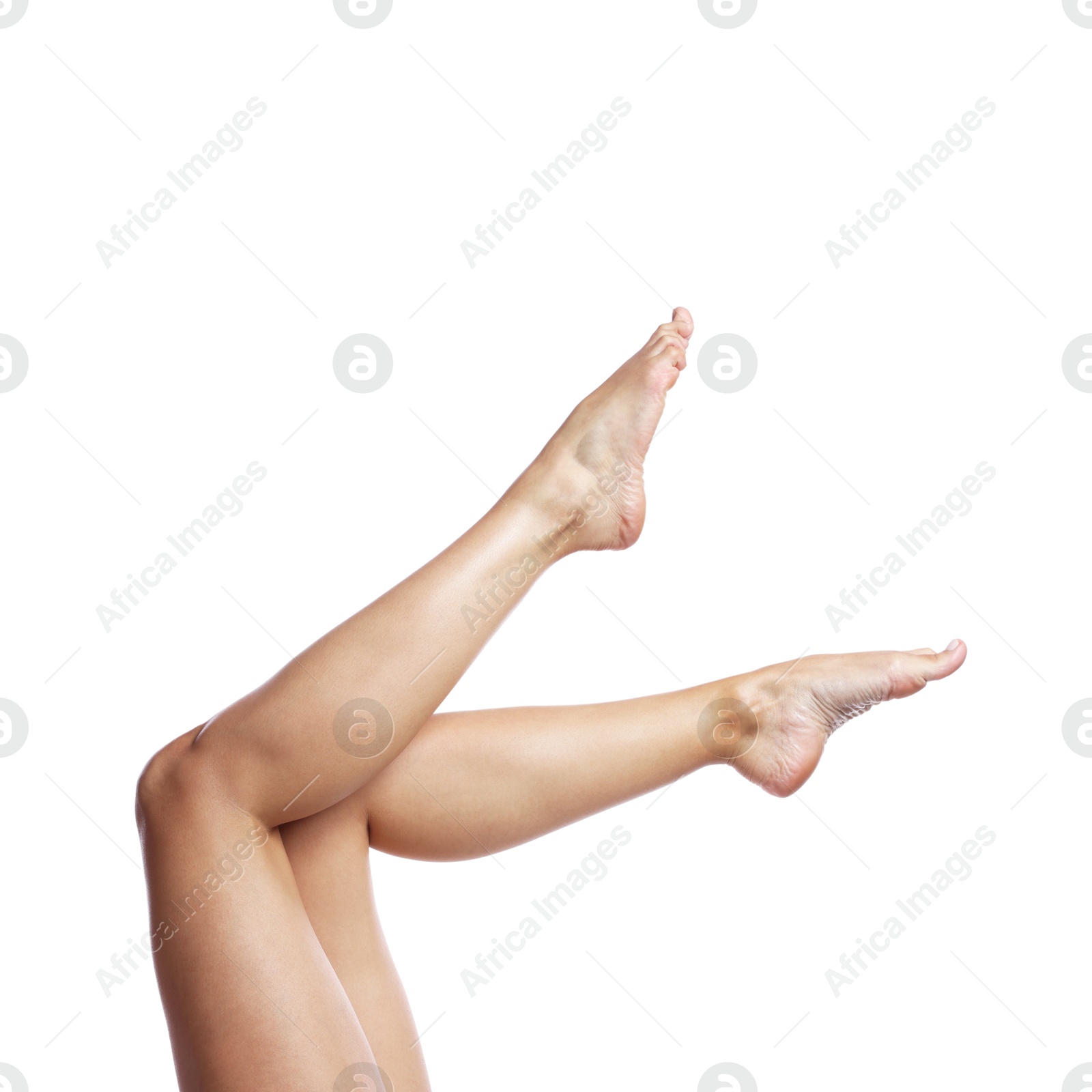 Woman with beautiful smooth legs after epilation on white background, closeup Photo of Woman with beautiful smooth legs after epilation on white background, closeup