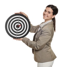 Photo of Targeting. Smiling businesswoman with dart board on white background