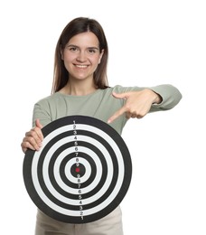 Photo of Targeting. Smiling woman pointing at dart board on white background