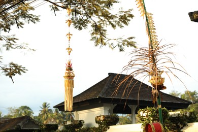 Photo of City street decorated with beautiful traditional penjor