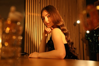 Photo of Woman with beautiful long hair in dressing room