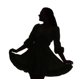 Photo of Silhouette of woman in dress on white background