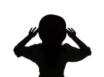 Photo of Silhouette of woman in hat on white background, back view