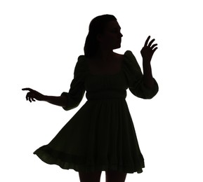 Photo of Silhouette of woman in dress on white background