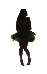 Photo of Silhouette of woman in dress on white background