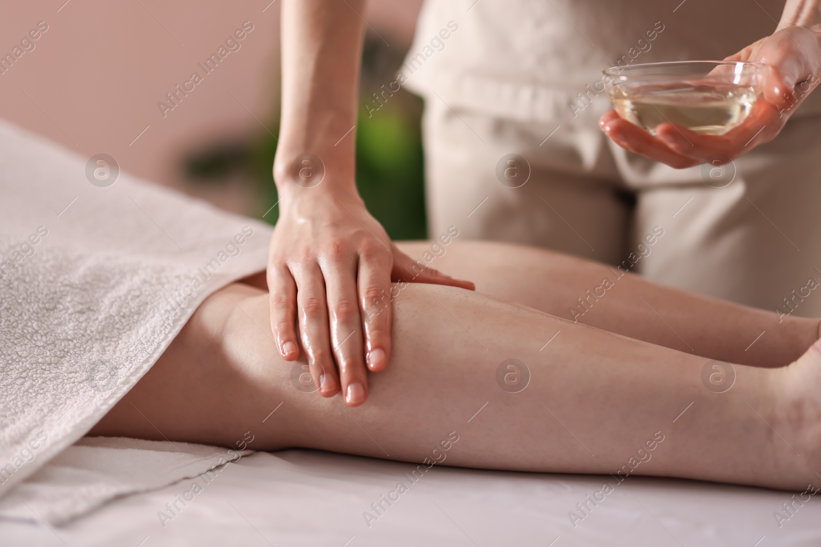Woman receiving massage in spa salon, closeup Photo of Woman receiving massage in spa salon, closeup