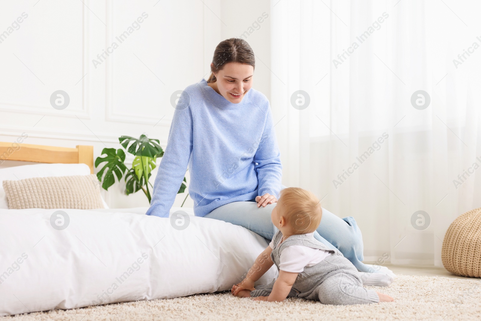 Mother and her little baby at home Photo of Mother and her little baby at home