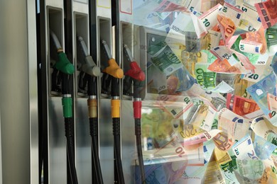 Image of Fuel price. Gas filling station and falling euro banknotes, double exposure