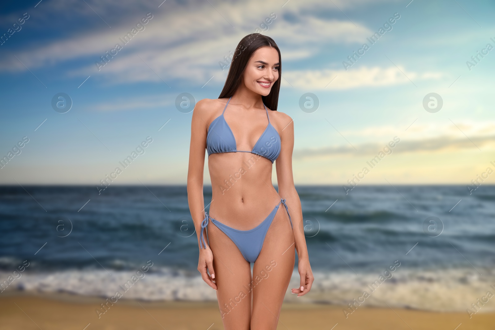 Attractive woman in swimsuit on beautiful beach Image of Attractive woman in swimsuit on beautiful beach
