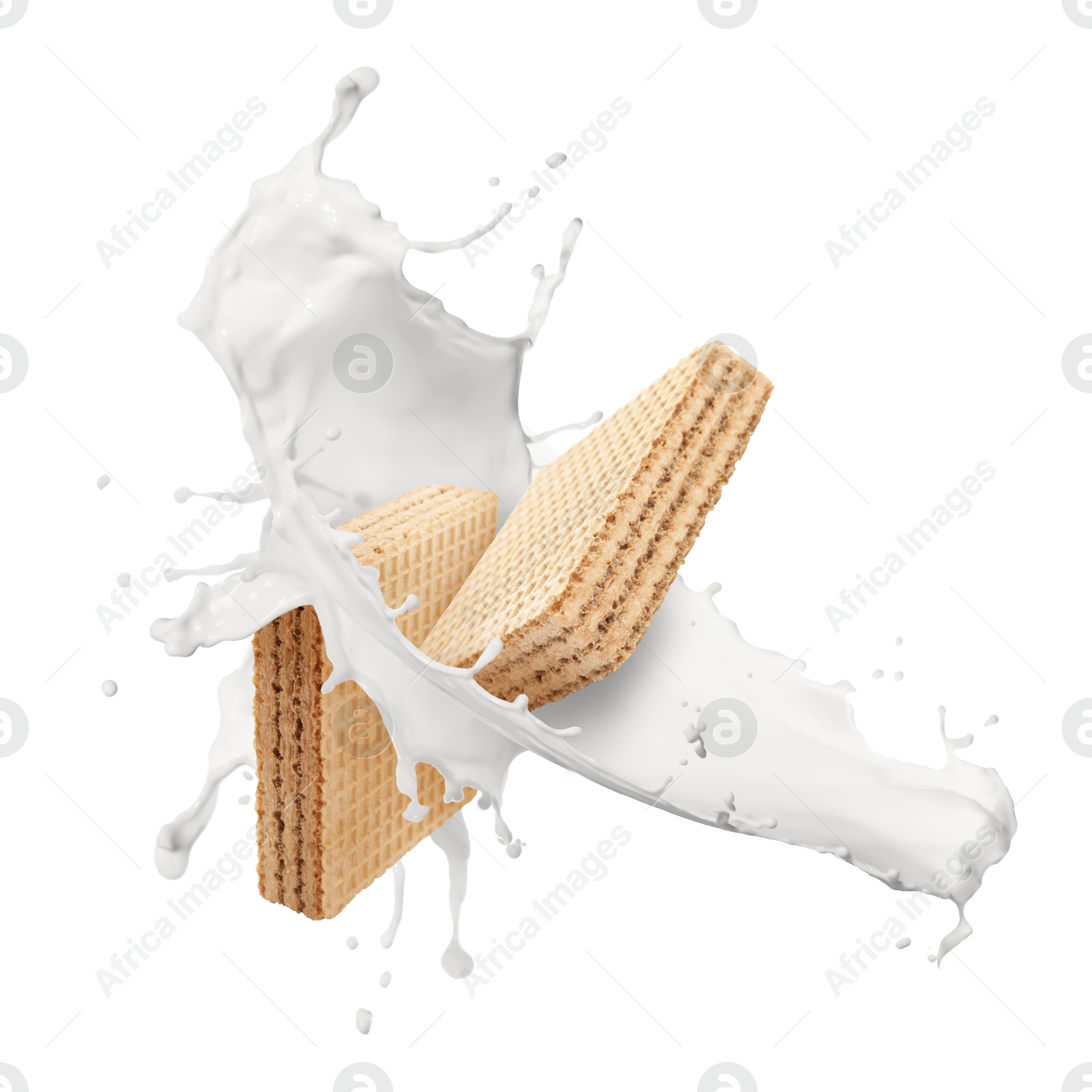 Tasty crispy wafers and splashing milk on white background Image of Tasty crispy wafers and splashing milk on white background