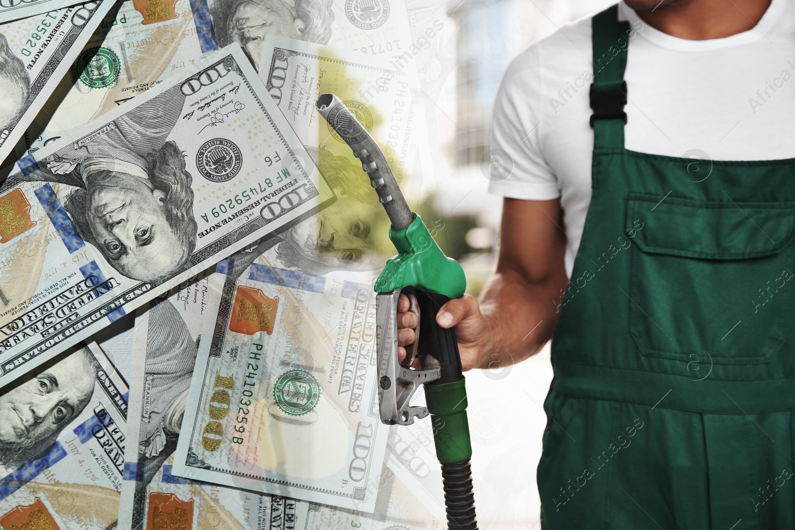 Fuel price. Gas station attendant and dollar banknotes, double exposure Image of Fuel price. Gas station attendant and dollar banknotes, double exposure