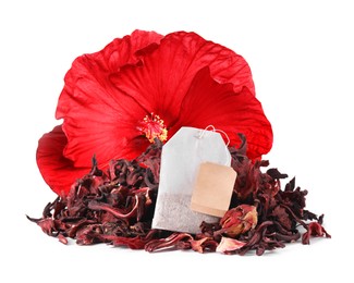 Image of Red hibiscus flower, tea bag and dried calyces on white background