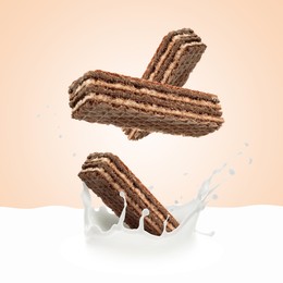 Image of Tasty crispy wafers falling into splashing milk against pink beige background