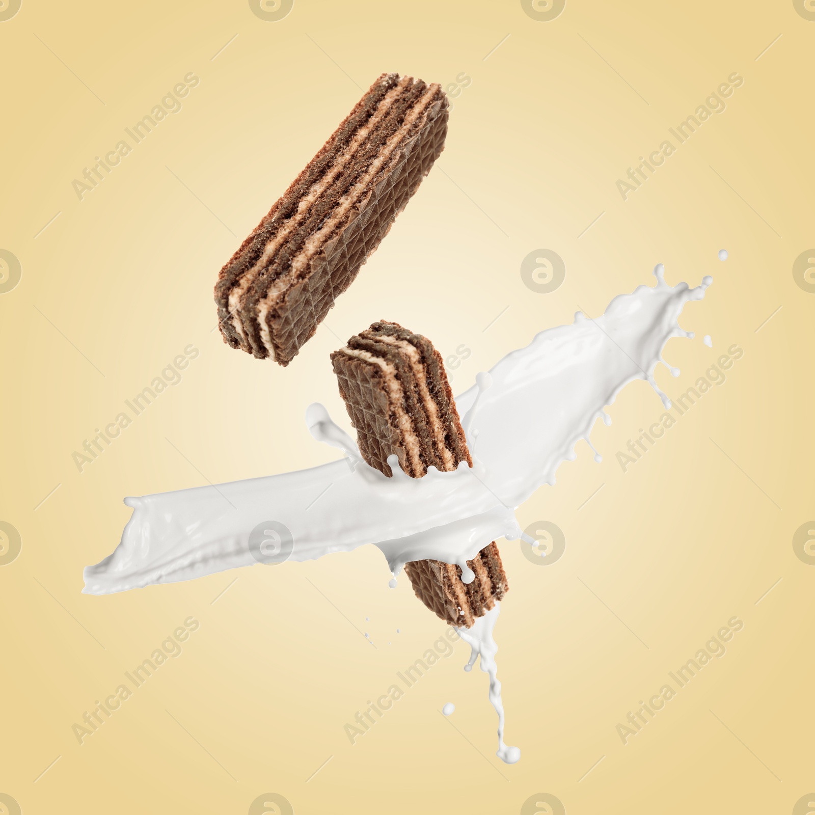 Tasty crispy wafers and splashing milk on dark beige background Image of Tasty crispy wafers and splashing milk on dark beige background