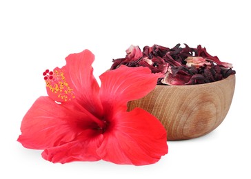 Image of Red hibiscus flower and bowl with dried calyces on white background