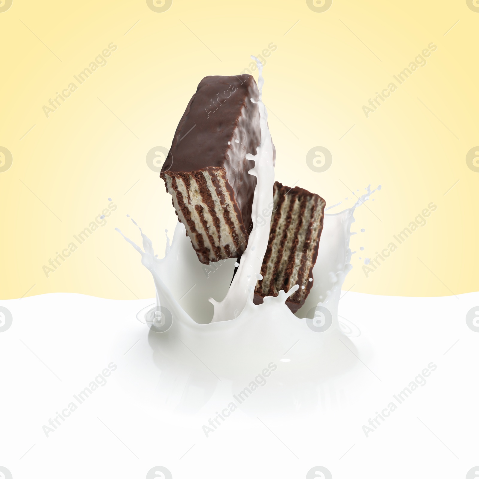 Tasty crispy wafer falling into splashing milk against beige background Image of Tasty crispy wafer falling into splashing milk against beige background