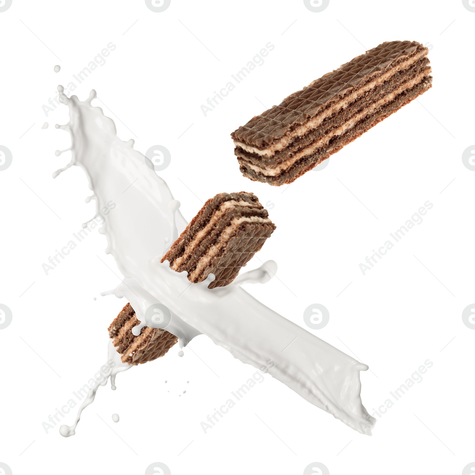 Tasty crispy wafers and splashing milk on white background Image of Tasty crispy wafers and splashing milk on white background