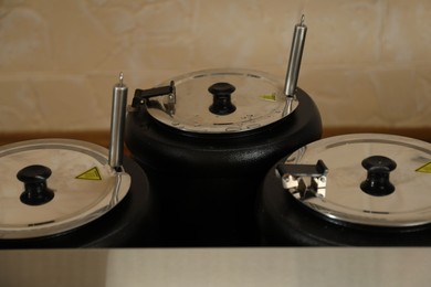 Photo of Cooking pots with tasty food in school canteen