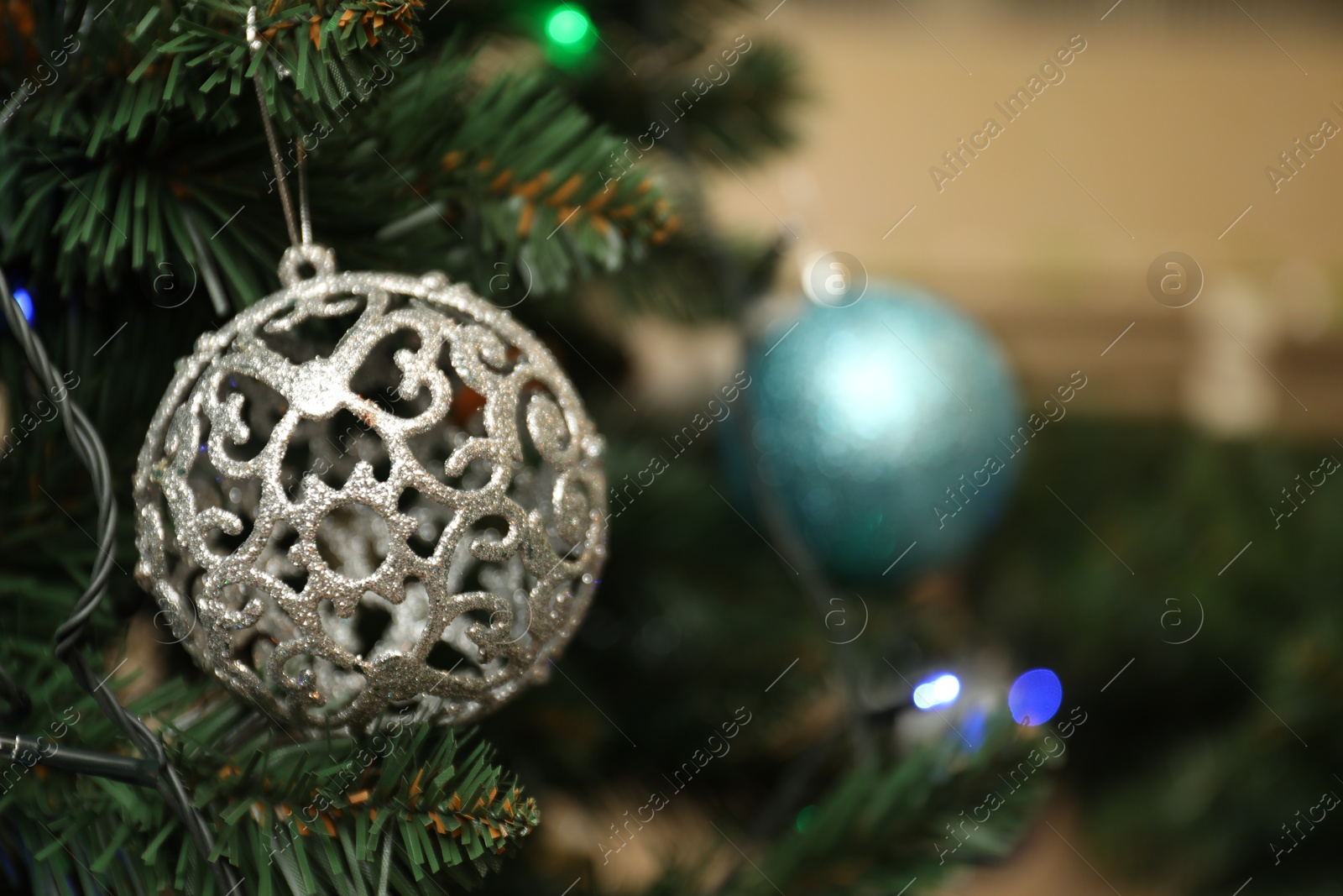 Decorated Christmas tree indoors, closeup. Space for text Photo of Decorated Christmas tree indoors, closeup. Space for text