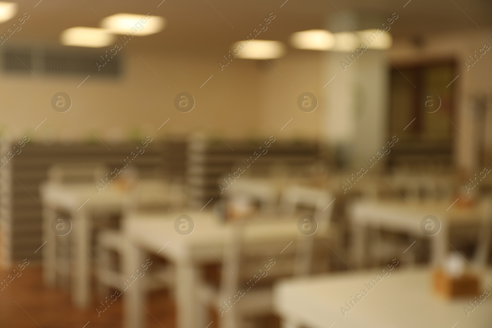 Blurred view of modern school canteen with new furniture Photo of Blurred view of modern school canteen with new furniture