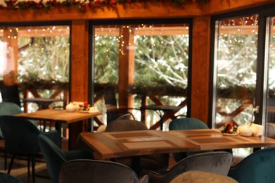Photo of Modern cafe interior with new stylish furniture