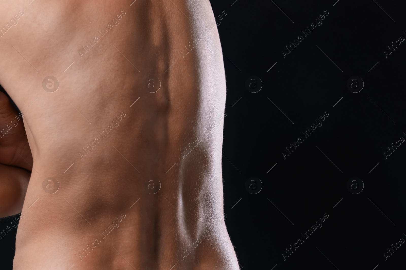 Man suffering from anorexia on black background, closeup. Space for text Photo of Man suffering from anorexia on black background, closeup. Space for text
