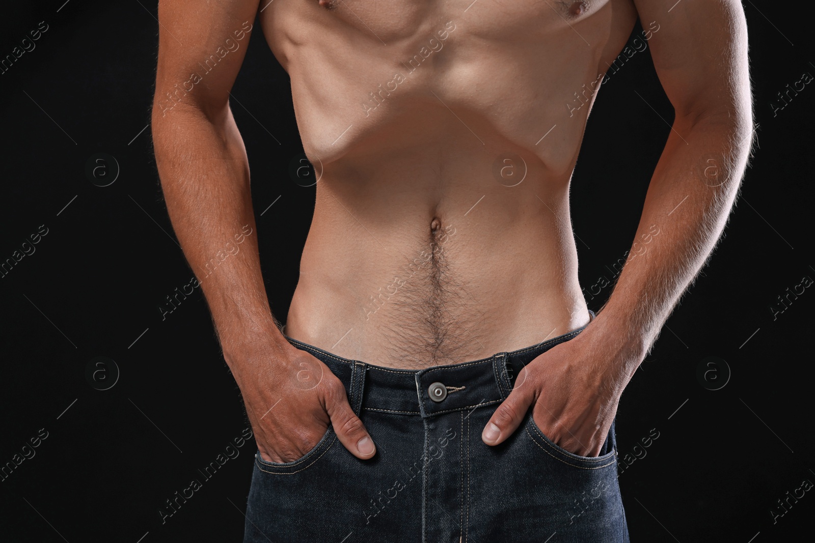Man suffering from anorexia on black background, closeup Photo of Man suffering from anorexia on black background, closeup
