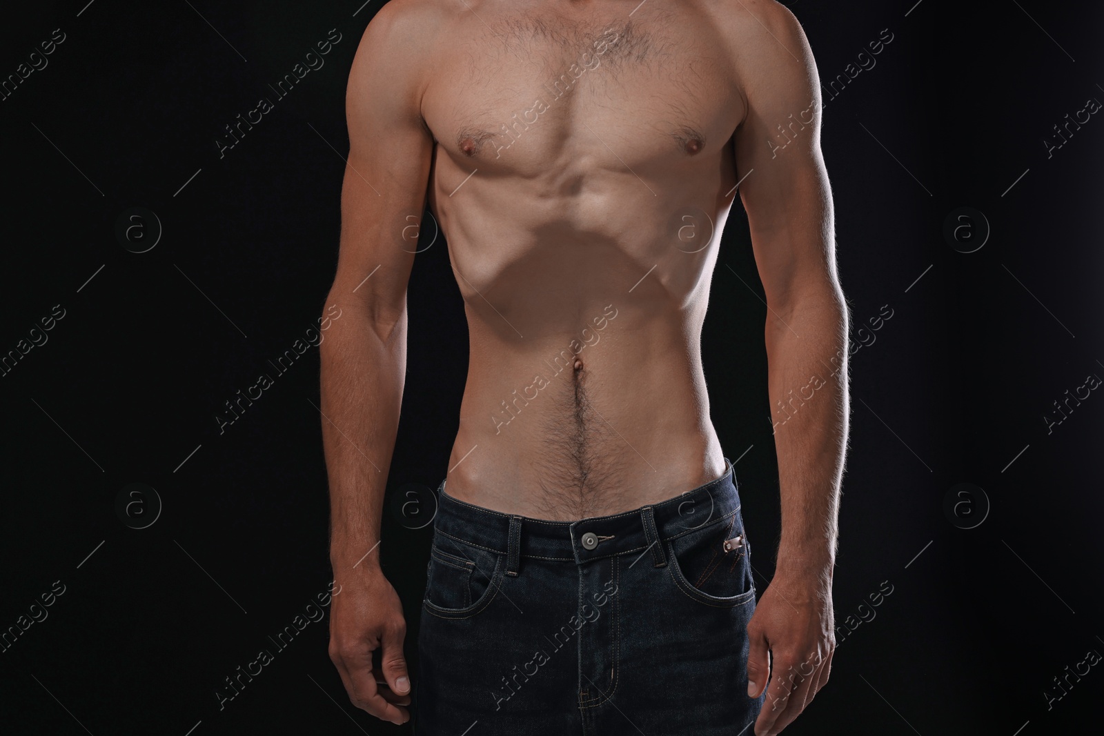 Man suffering from anorexia on black background, closeup Photo of Man suffering from anorexia on black background, closeup