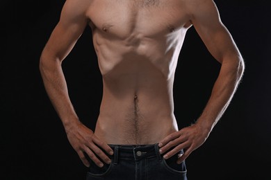 Photo of Man suffering from anorexia on black background, closeup