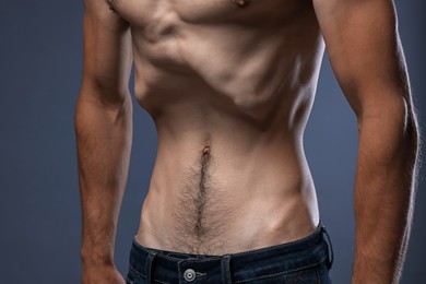 Photo of Man suffering from anorexia on grey background, closeup
