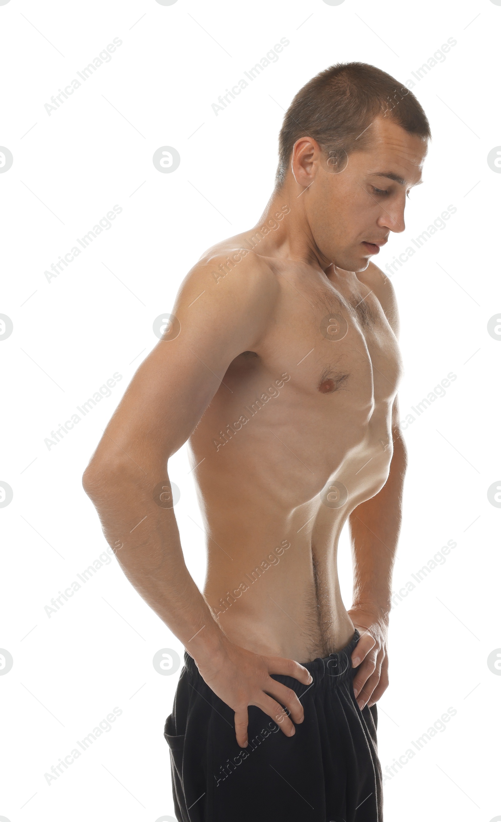 Man suffering from anorexia on white background Photo of Man suffering from anorexia on white background