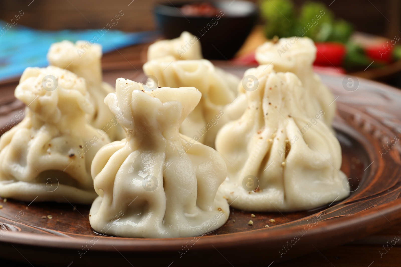 Many delicious khinkali on plate, closeup view Photo of Many delicious khinkali on plate, closeup view